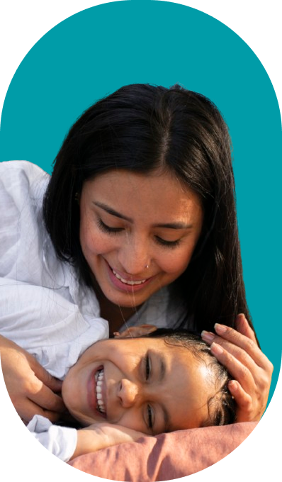 Mother and daughter smiling